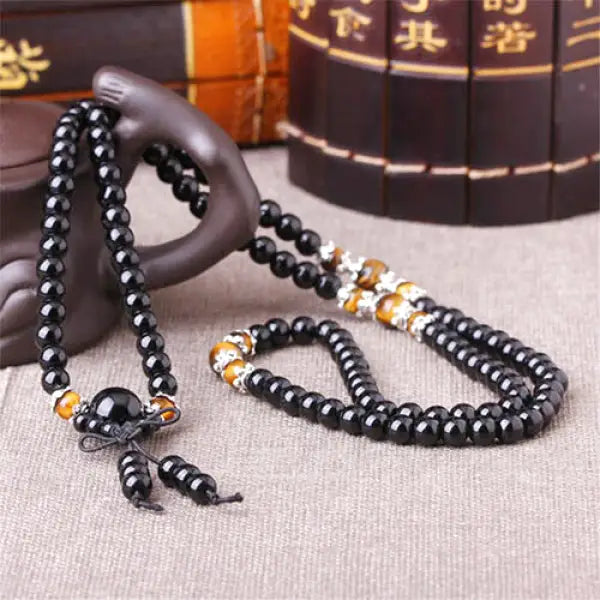 Chapelet-Bouddhiste-Onyx-Œil-de-Tigre