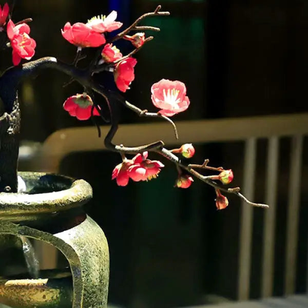 fontaine-a-eau-zen-fleur-abricotier-japon