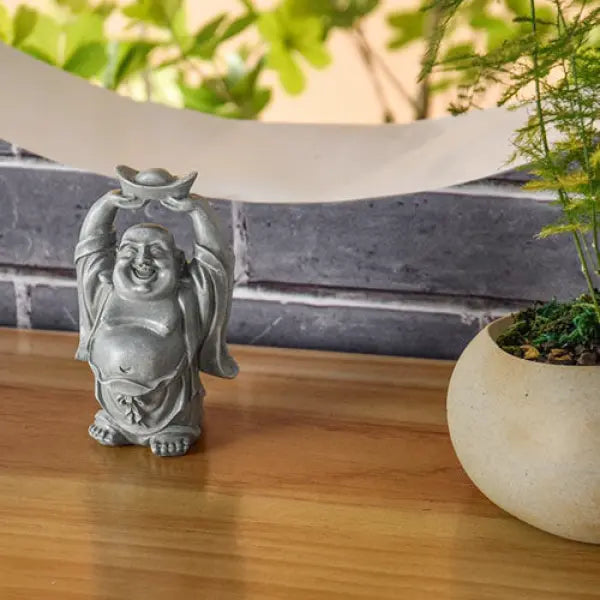 statue-bouddha-rieur-divinite-gros-ventre-porte-bonheur