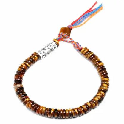 Bracelet-Bouddhiste-Perle-Œil-de-Tigre