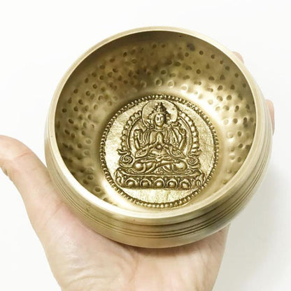 Bol tibétain chantant doré avec motif de bouddha 