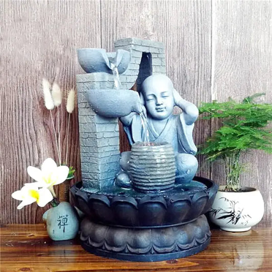    fontaine-a-eau-enfant-moine-meditation
