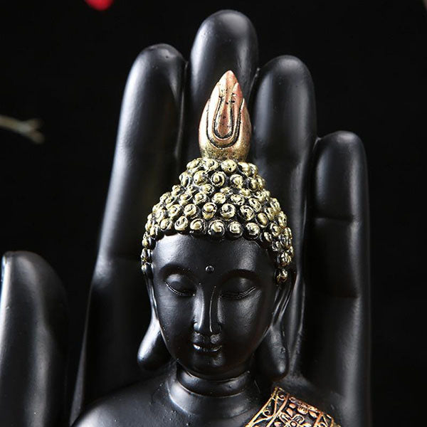 Statue-main-avec-tête-bouddha